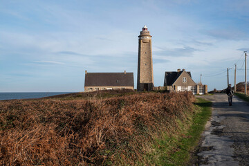 Fototapeta na wymiar Lighthouse in Brittany, France by the sea