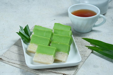 Talam ketan pandan (Kuih talam) or Kuih Seri Muka, traditional Malaysian Nyonya sweet cake. Also...