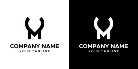 Obraz premium horn-themed graphic image of the letter M. on a black white background. basic vector graphics.