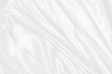 Closeup elegant crumpled of white silk fabric cloth background and texture