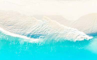 Aerial view of Soft blue ocean wave on the beach and soft wave background.