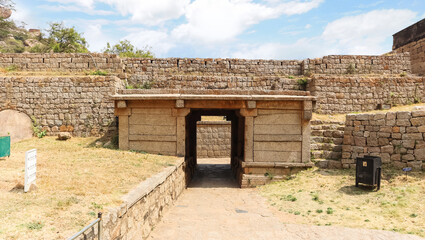Fototapeta na wymiar Ruined walls and entrance lock at Chitradurga fort, Chitradurg, Karnataka, India