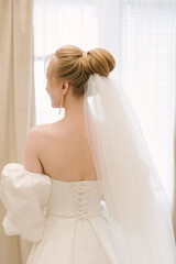 Morning of the bride, details of the wedding day, beautiful curls close-up