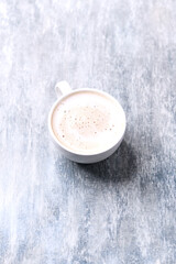 Coffee with milk on wooden background. Close up. Copy space. 