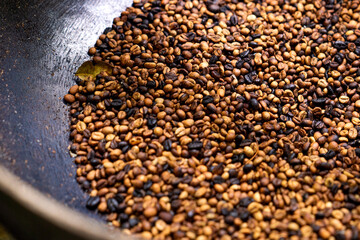  Brown roasted cocoa beans. Background, the process of making cocoa