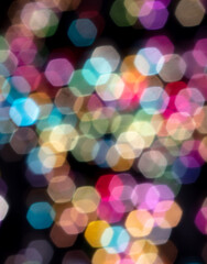 Multicolored festive bokeh as background.