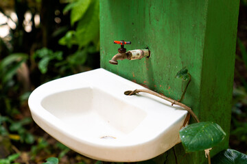 Rural exotic washbasin sink outdoors close-up