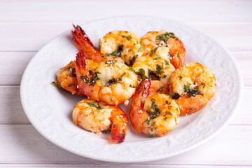 Skewered grilled shrimp with sauce