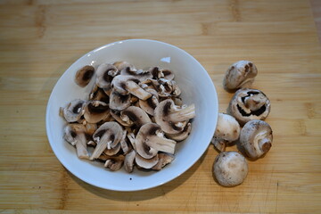 sliced quality White organic Mushrooms. plant based cooking ingredients