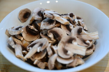 sliced quality White organic Mushrooms. plant based cooking ingredients