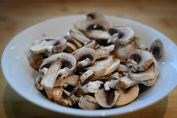 sliced quality White organic Mushrooms. plant based cooking ingredients
