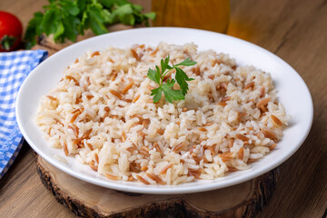Traditional delicious Turkish food; Turkish style rice pilaf (Turkish name; Arpa sehriyeli pirinc pilavi)