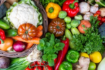 Zelfklevend Fotobehang Raw vegetables and fruits background.Healthy organic food concept. © Esin Deniz