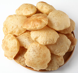 Indian food - Puri Bhaji. North India. Puri is a deep fried bread made from whole wheat flour & Served with Potato curry , bhaji or alu ki sabji.or Potato curry or dum alu curry
