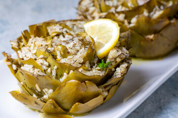 Fresh delicious stuffed artichoke, best Turkish food. Turkish name; Zeytinyagli Enginar Dolmasi