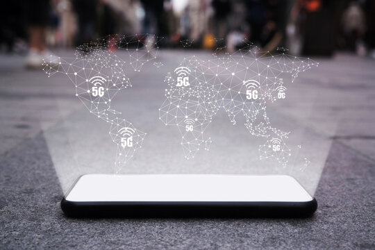 Smartphone lie on the ground, digital world map