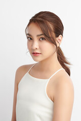 Fototapeta premium Beautiful young asian woman with clean fresh skin on white background, Face care, Facial treatment, Cosmetology, beauty and spa, Asian women portrait.