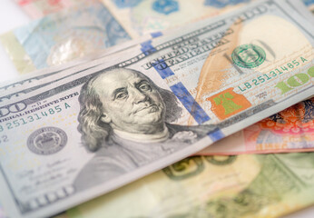 currencies of dollar, yuan and another money