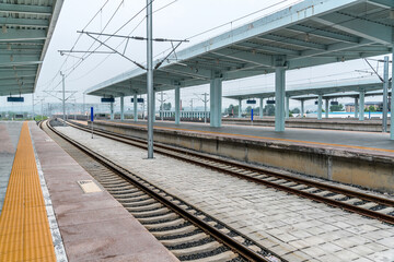 Fototapeta na wymiar empty railways station just waiting train