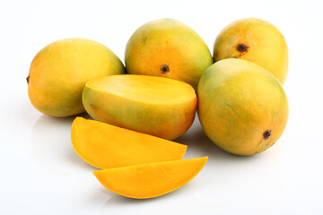 King of fruits; Alphonso Mango fruit with green leaf isolated on white background