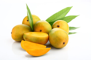 King of fruits; Alphonso Mango fruit with green leaf isolated on white background
