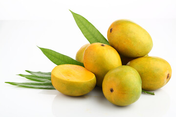 King of fruits; Alphonso Mango fruit with green leaf isolated on white background