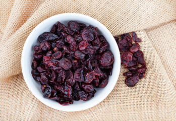 dried cranberries on rustic surface with copy space