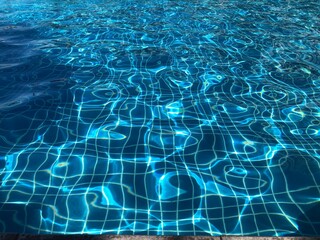 Beautiful Ripple water in swimming pool reflection.