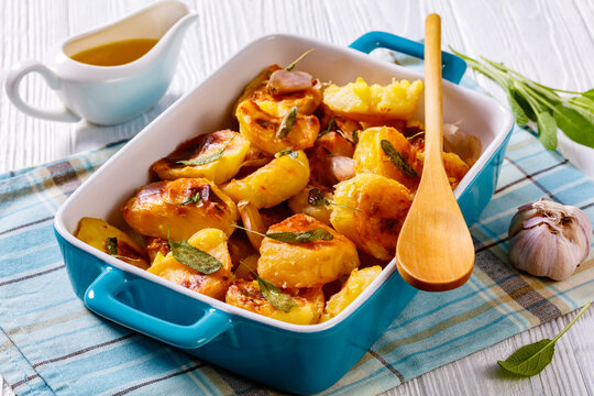 roasted squashed potatoes with garlic and sage