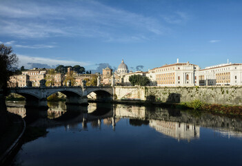 Fototapeta na wymiar View from the banks of the river Tiber to St. Peter's Cathedral in Rome