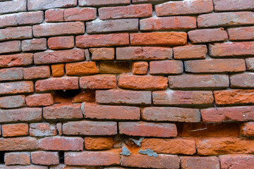 An old brick wall of solid brick
