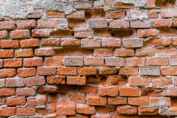 An old brick wall of solid brick