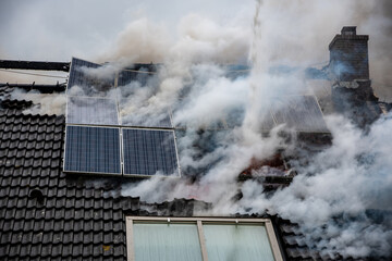 smoke on the roof with solar panels