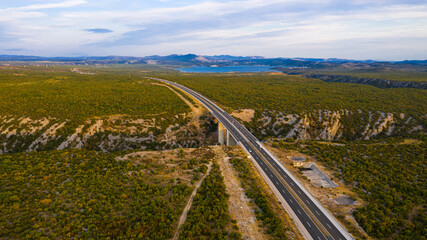 Fototapeta na wymiar Aerial View over Highway and Gaspipeline, Prokljan, Croatia