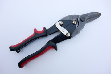 Obraz premium Scissors for cutting metal on white isolate. Hand scissors for metal.