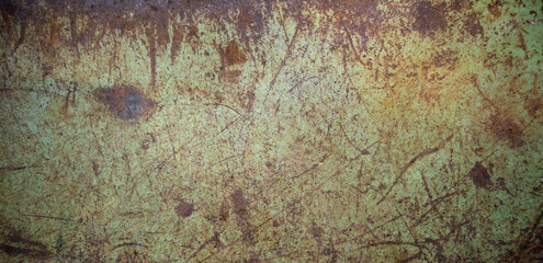 Rectangular texture of an iron wall with traces of rust. Old green metal background for text. Rusty iron.