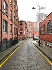 Obraz premium City scene in Manchester City centre with buildings and landmarks. 