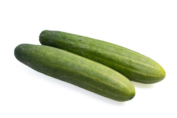 two fresh cucumbers on a white background