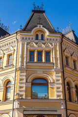 Fototapeta na wymiar Moscow, Russia, April 6, 2022. Typical historical architectural in downtown, Kuznetsky most street, facade fragment