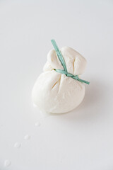 burrata is a fresh italian cheese made from mozzarella and cream