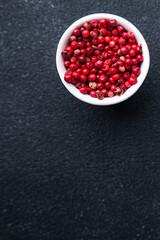 pink peppercorns pepper allspice pepper spices healthy meal food diet snack on the table copy space food background rustic top view