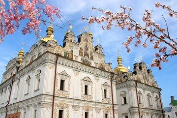 Kyiv cathedral - Pechersk Lavra monastery. Spring time cherry blossoms.