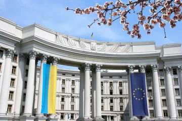 Foto op Canvas Ukraine landmark - Ministry of Foreign Affairs in Kyiv city. Spring time cherry blossoms. © Tupungato