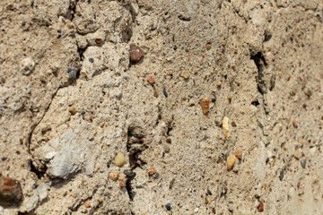 Sand background texture closeup, selective focus, copy space.