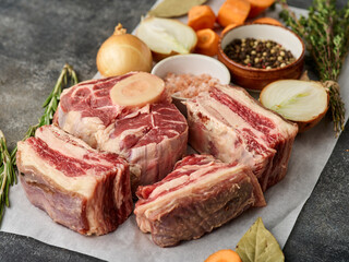 Set of raw meat for making broth. Raw fresh from butcher small pieces of veal bone with meat base for soup concentrate