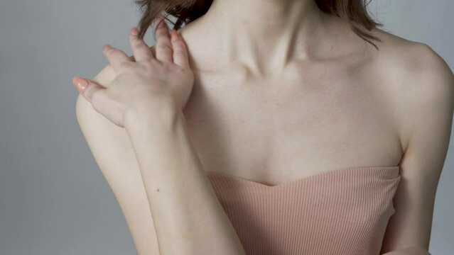 The shoulder of a young woman. Skin Care