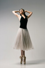 ballerina improvises in a photo studio