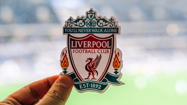 September 12, 2021, Liverpool, UK. Liverpool F.C. Football Club emblem against the backdrop of a modern stadium.