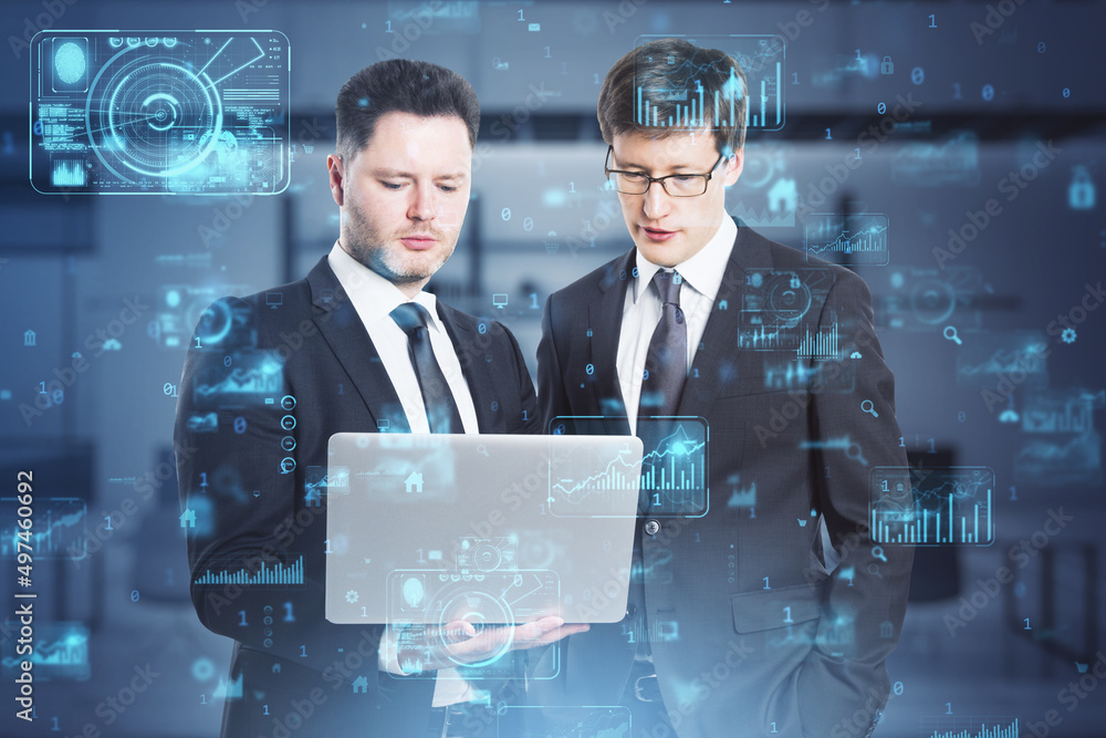 Poster Attractive european businessmen using laptop with abstract creative business charts and binary code on blurry office interior background. System engineering and digital transformation concept. 
