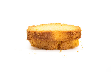 selective focus, crispy rusk, cake rusk over white background